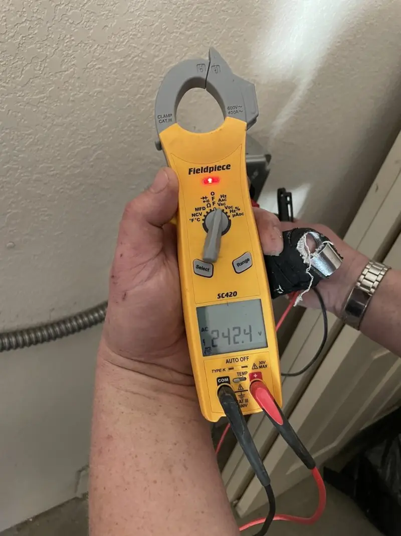 Voltage testing with clamp meter during Hot Tub / Pool Electrical Wiring in Pasco